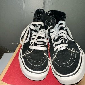 Vans Black and White High-Top Sneakers